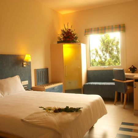 Radha Hometel Bangalore Extérieur photo