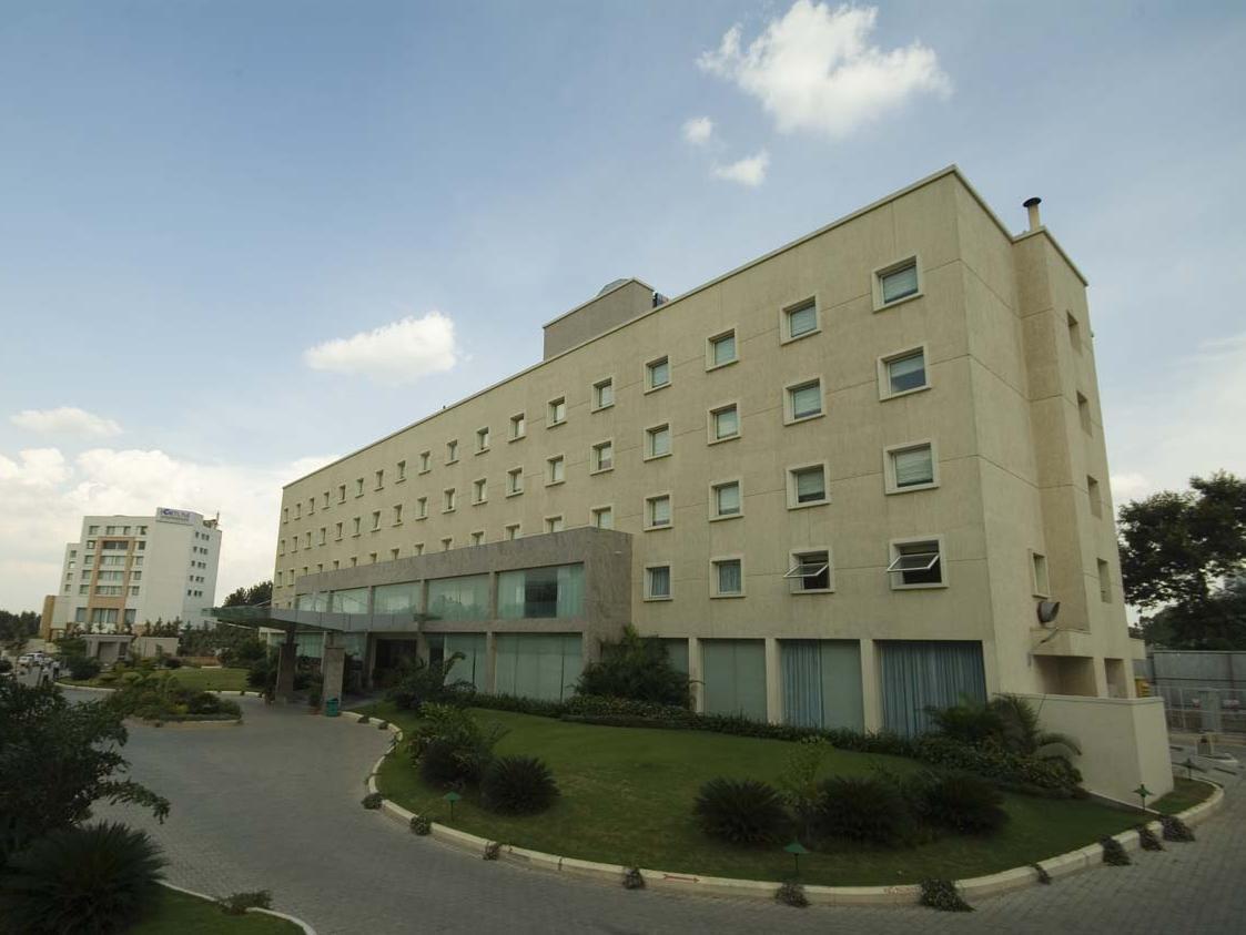 Radha Hometel Bangalore Extérieur photo
